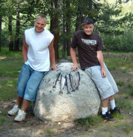 Striking a pose similar to one in a photo of my sister and brother and I with a stringer, probably in the mid 1970s.