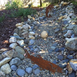 Faux creek bed and faux fish.